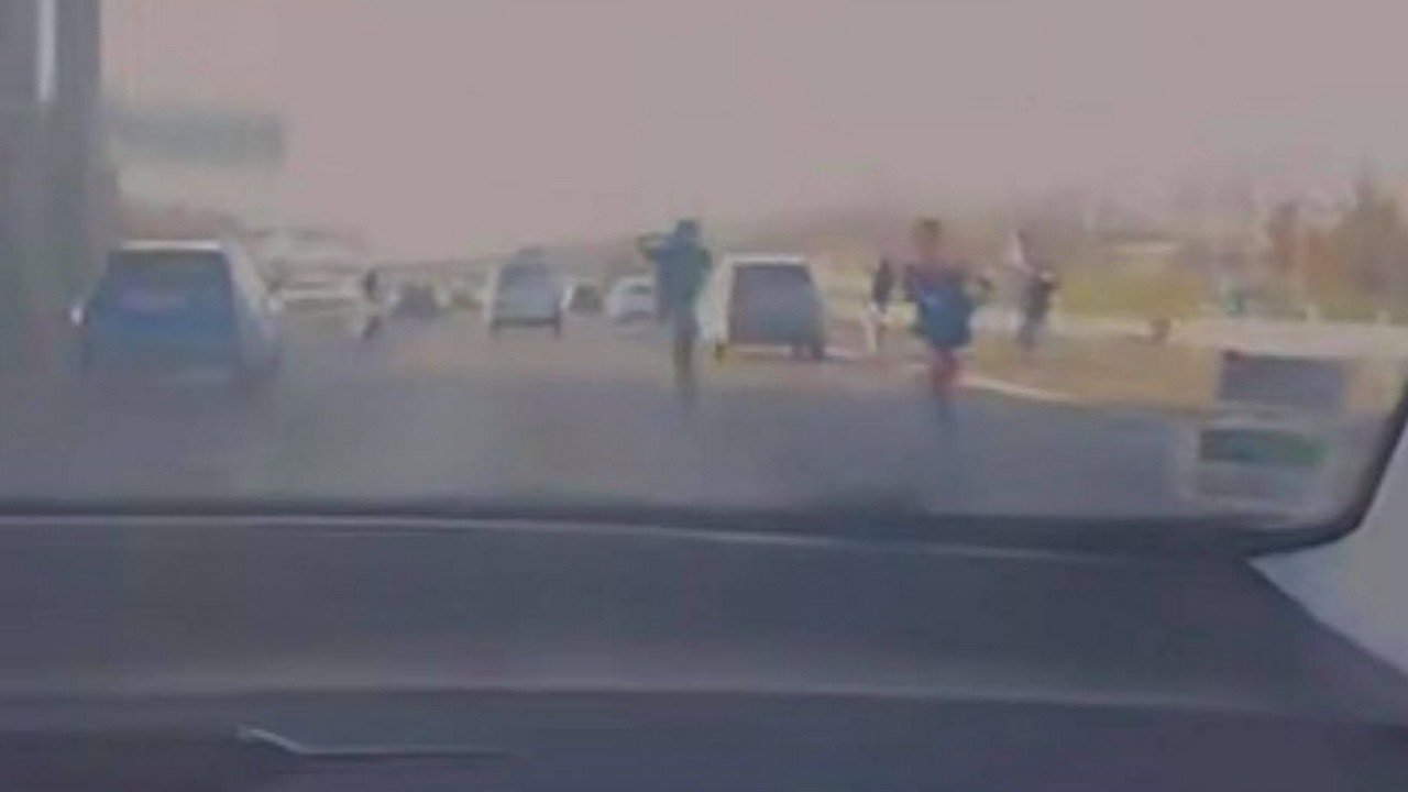 a gigantic rodeo on the ring road with a dozen two-wheelers