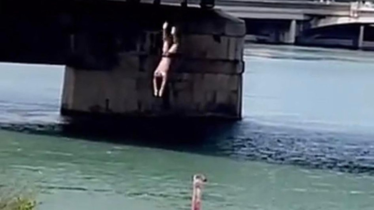 they jump into the Rhône from the Guillotière bridge